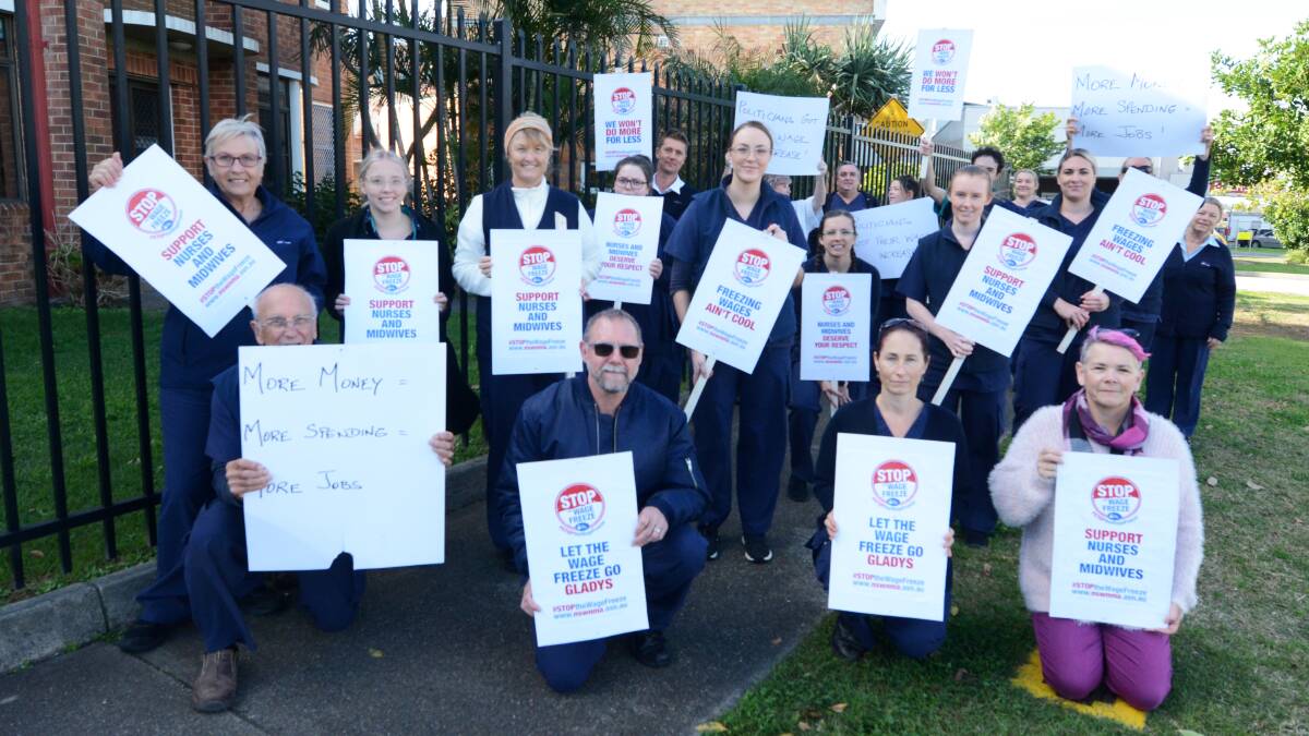 Nurses protest during their lunch break in front of Manning Base Hospital on Tuesday.