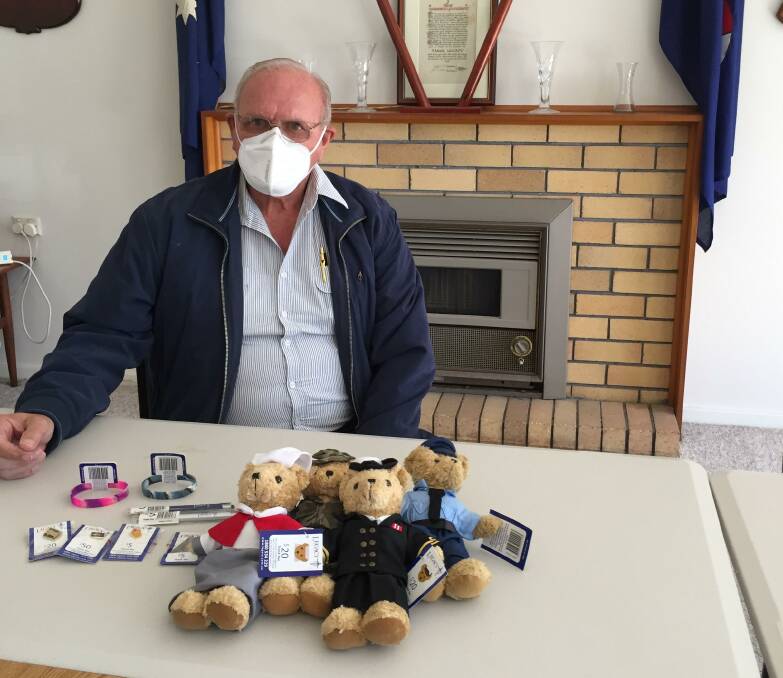 Taree Legacy president Hans Rooimans with some of the merchandise that can be purchased to support Legacy.