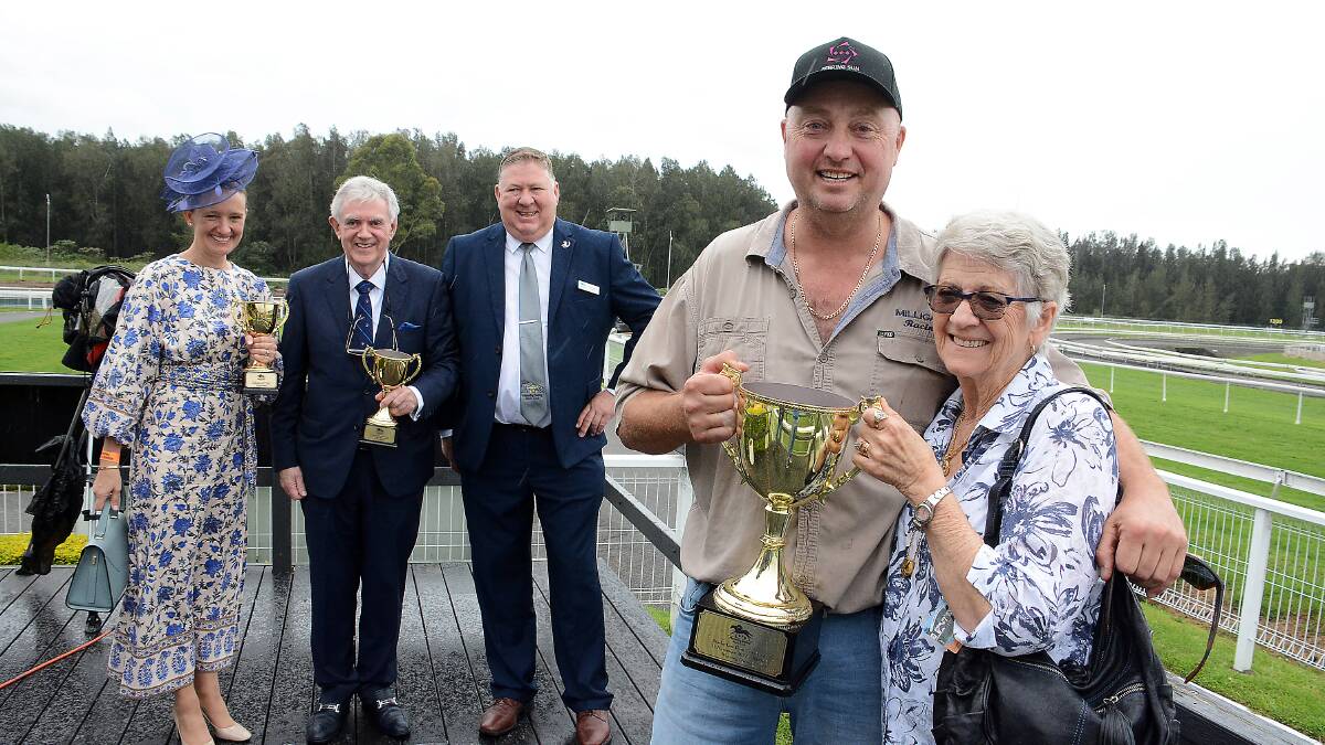 Taree Cup 2021 winner Charmmebaby: Trainer Glen Milliganm, with mum Margaret and the Taree Cup. In the background, Katie and Tim Stack representing cup sponsor Stacks Law Firm and Manning Valley Race Club chairman, Greg Coleman.