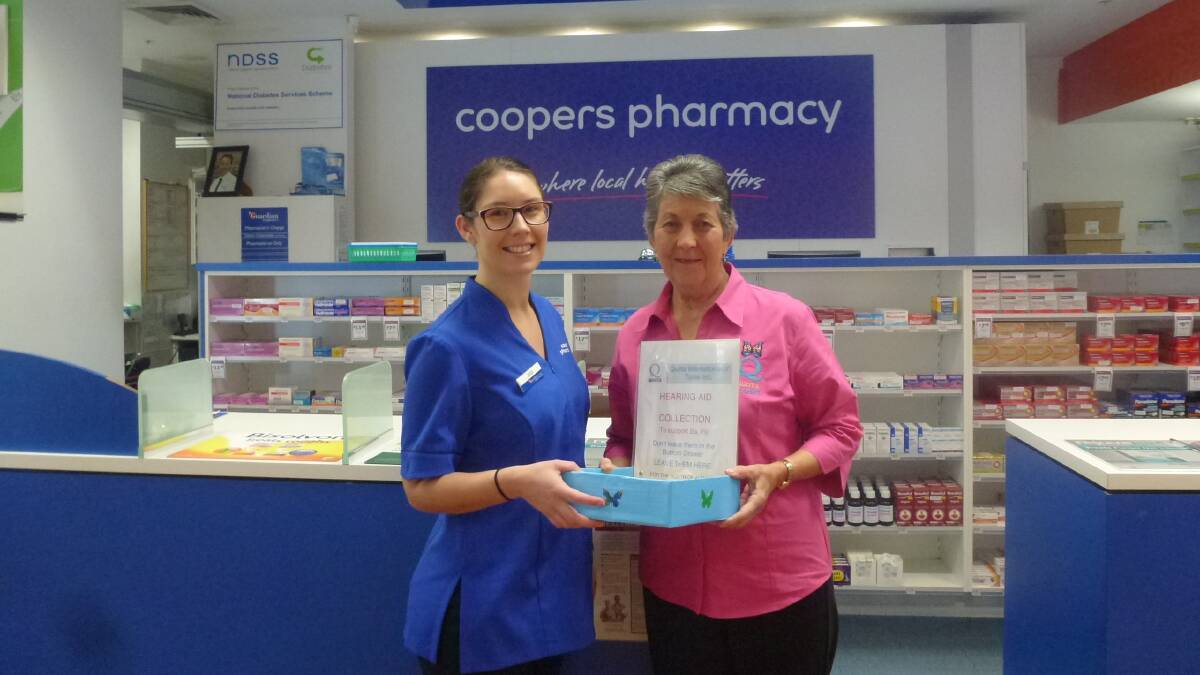 Drop off point: Jessica Hume of Coopers Pharmacy in Manning Mall with Taree Quotarian Dawn Beer during the August campaign to collect unwanted hearing aids.
