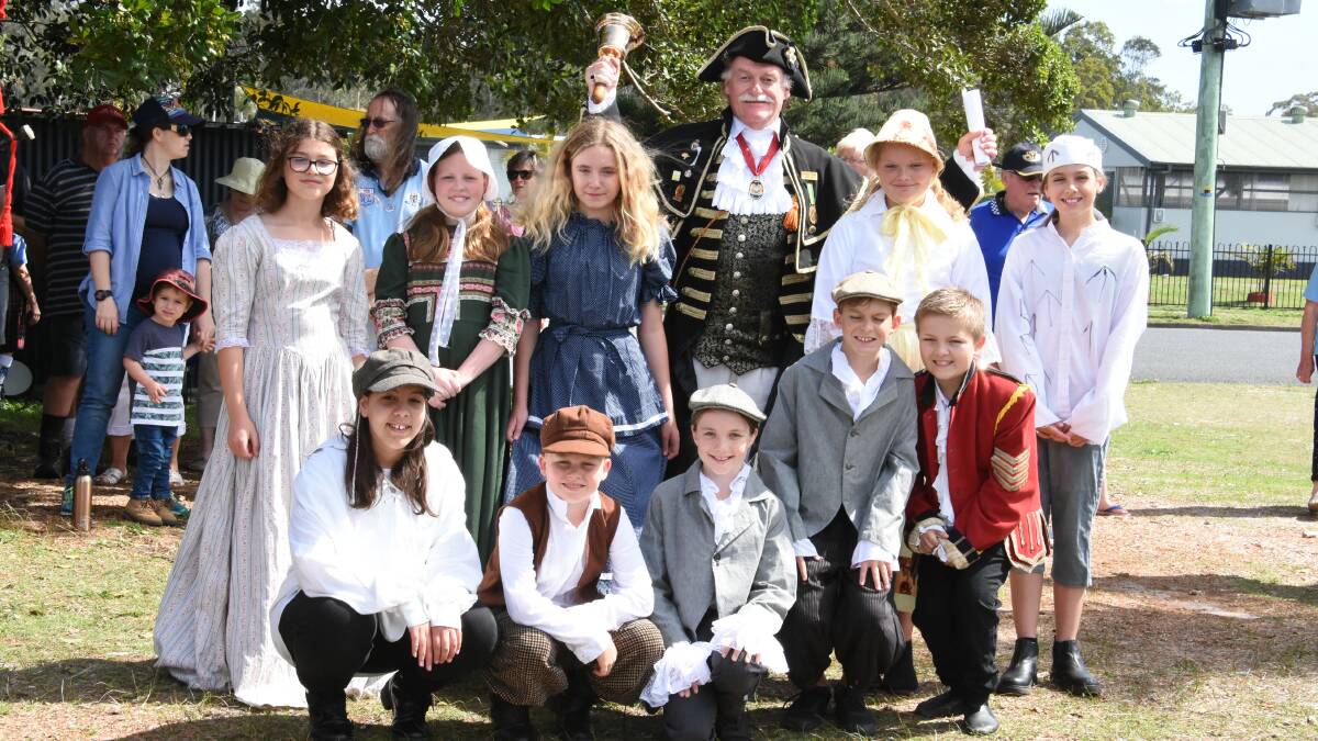 Students from Harrington Public School, who re-enacted explorer John Oxley's arrival, with town crier Stephen Clarke.