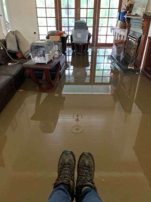 Libby Robson awaits rescue from her home at Oxley Island
