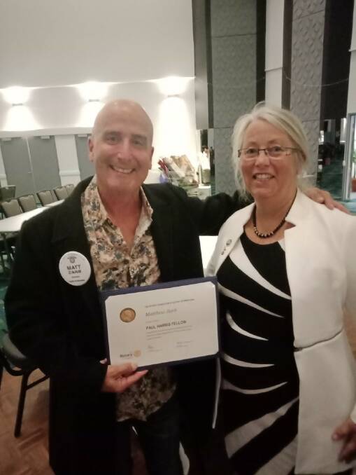Newly inducted Paul Harris Fellow, Matt with outgoing president of the Rotary Club of Taree on Manning, Richelle Murray at the district changeover.