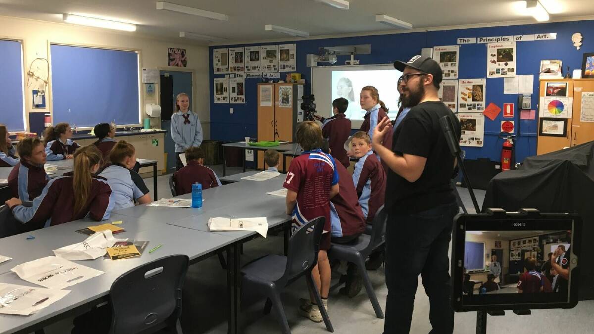 REC Ya working with students at Taree Christian College.