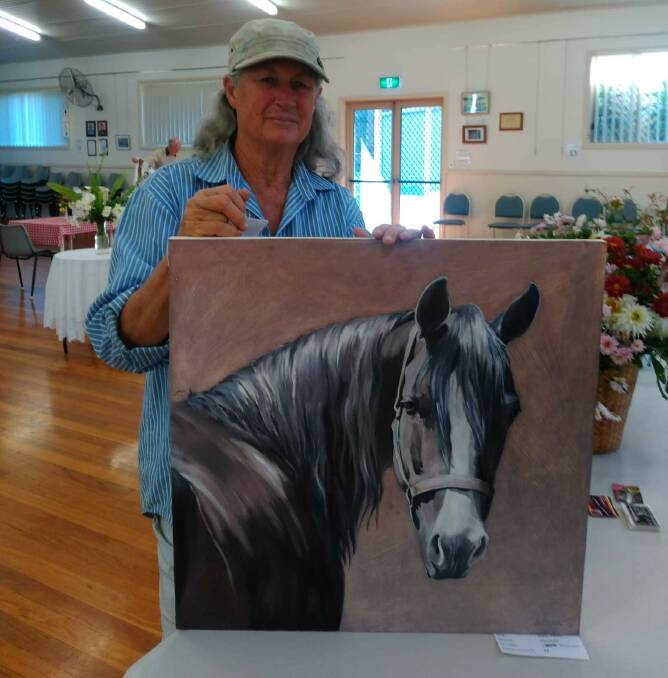 Sue Brook, winner of the Equine art section at the 2019 show with her oil painting "Apple, Please." Photo supplied.