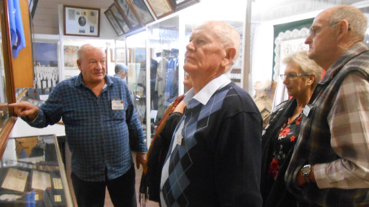 Museum volunteer Terry, with Probus members Alan Martin and Arthur Southwell and their partners at Wingham Museum.