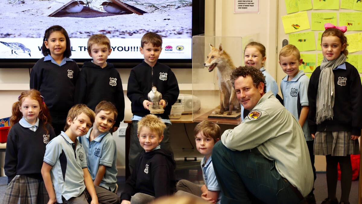 Tinonee Public School students are Manning shorebird experts - pictured with NPWS Discovery Ranger Peter Katsamangos.