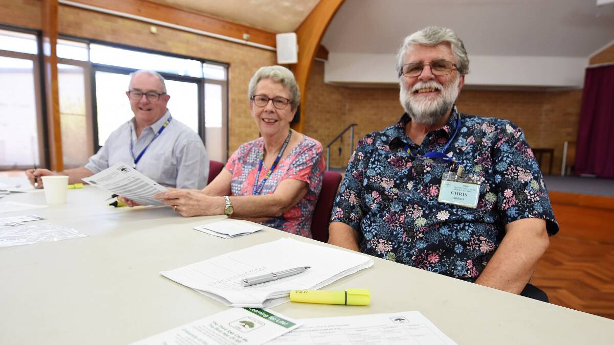 U3A secretary Chris Abbott (right) with Ross Connell and Anne Haydon at the enrolment day in January.