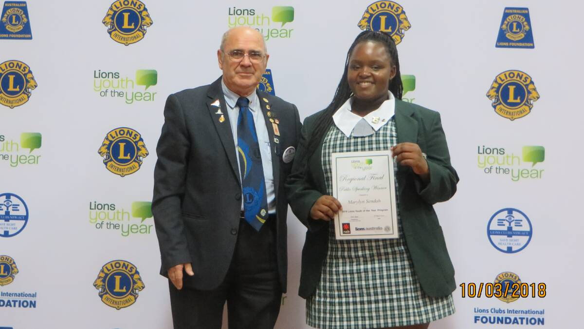 Lions Youth of the Year: Regional Three chairman, Kevin Thornton congratulates Chatham High student, Marylyn Sendah on winning the public speaking section of the competition.