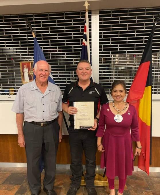Richard McGovern (centre) received the donation for Westpac Helicopter, here with golf day organiser Kevin Sharp and Taree Rotary president Susie Ploder.
