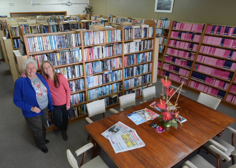 Huge selection: Taree Literary Institute's secretary Suzanne Booth and librarian Kylie Attard would like more people to visit the institute. 