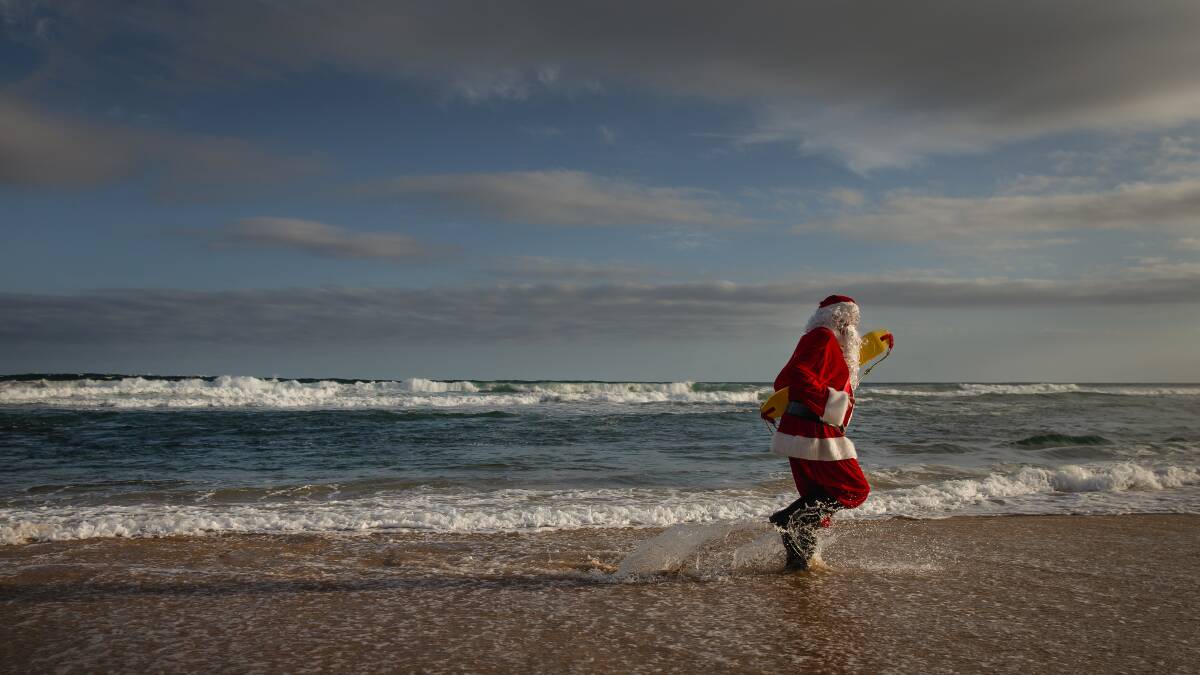 FROM THE ARCHIVE: Cooks Hill Surf Life Saving Club's Santa aka John Mayo from 2022. Picture by Marina Neil