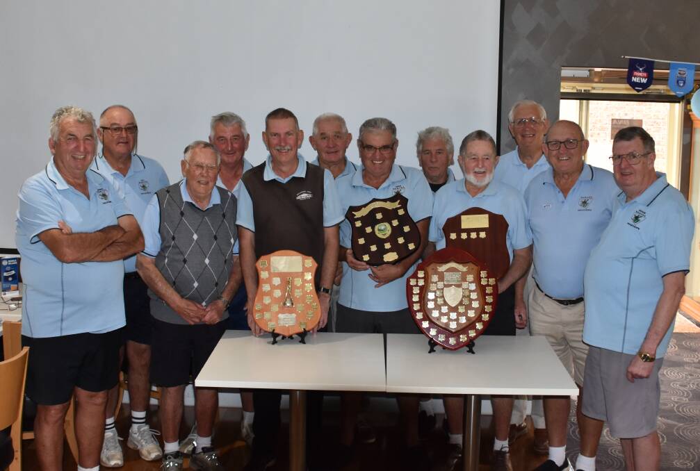 CLEANING UP: Wauchope Men's Veteran Golf Club celebrate winning all the shields they played for this year.