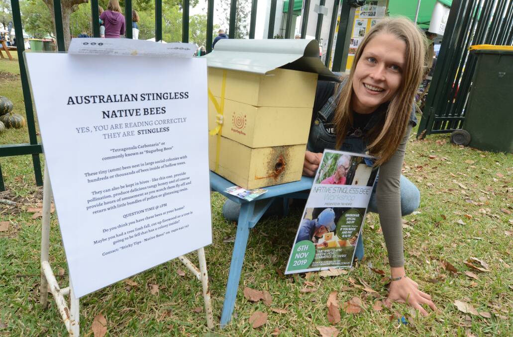 Chelsea Hands at the the 2019 Taree Envirofair with an Australian native bee hive. Photo Scott Calvin