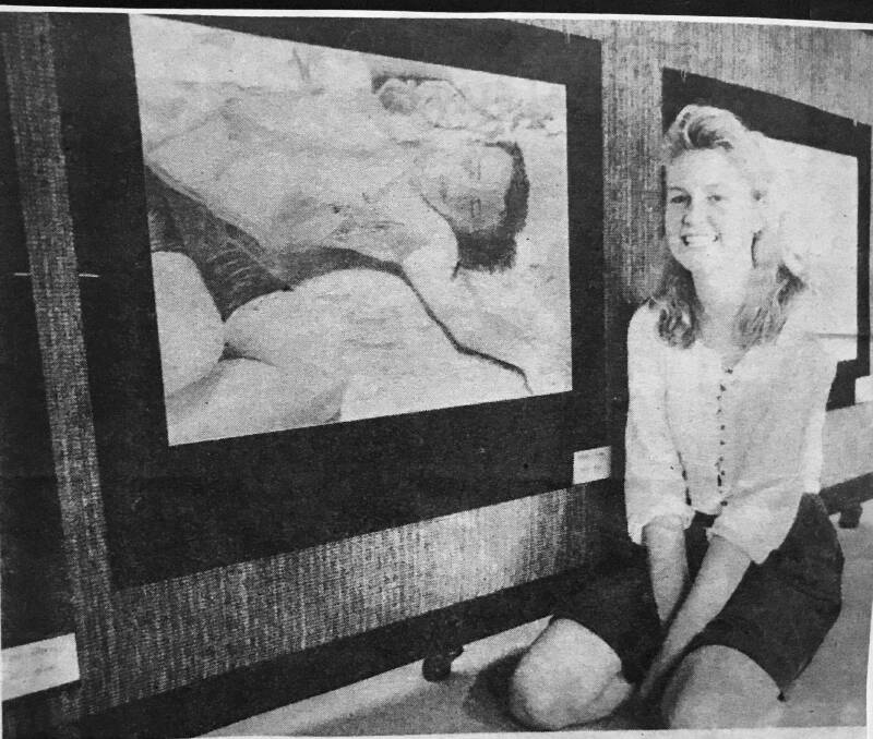 Michelle Young (nee Vine) in the Manning River Times during "The Hanging Art" exhibition in the Manning Regional Art Gallery in 1990. 