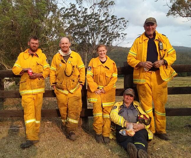 Jason Martin, Clint McDermott (Paul and Kim's son), Jessica Woolley, Paul McDermott and Bill Rumble taking a break during the Mill Creek fire at Stroud in November 2019. Photo Kath Woolley