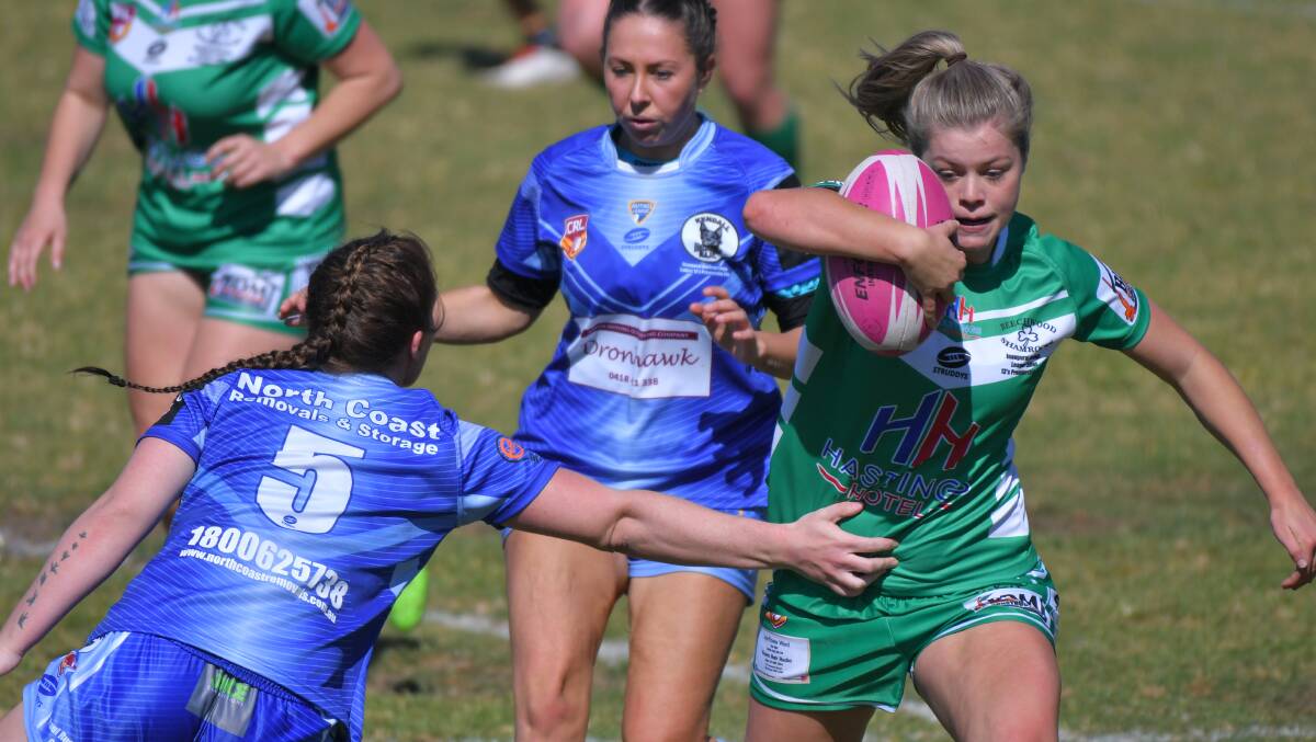 Hard yards: Larissa Ward evades the Kendall defence in this year's Hastings League women's grand final.