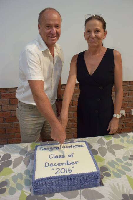 Craig Fitzroy (Tuncurry campus) and Gina Scott (Taree campus) cut the official graduation cake. 