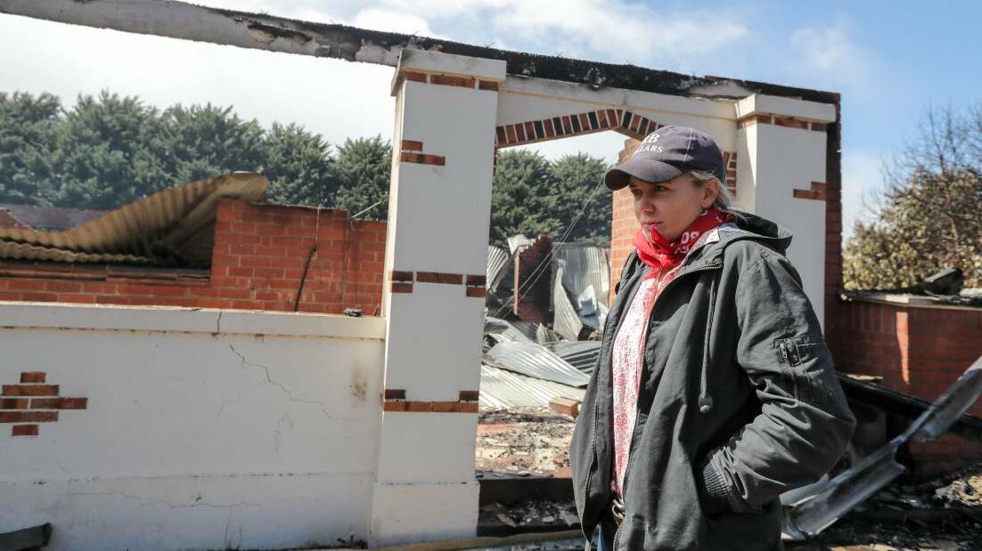 Gazette resident Elle Moyle in front of her brother's burnt out house. Picture: Rob Gunstone

