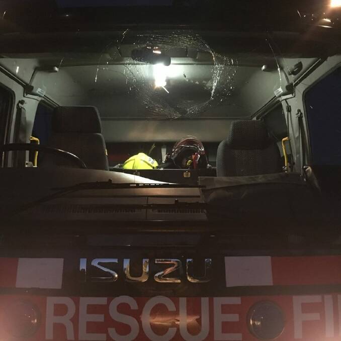 Shattered: The smashed windscreen of the fire truck. Photo: Taree Fire and Rescue.