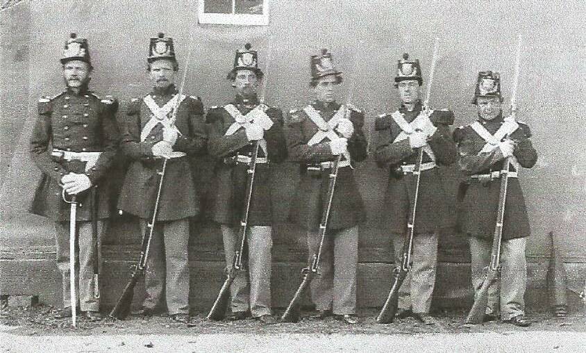 A Marine officer (left) in full dress and his troops photographed in 1862 by Matthew Brady. 
