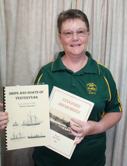 Tinonee Historical Society member Lois de Lange with the books she compiled for the Tinonee Historical Society.