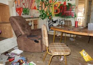 Not so pretty: Inside the four roomed cottage has been vandalised and left in a mess.