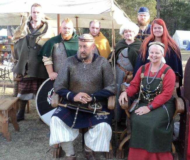 Baron Ulf and Baroness Sigrid with attendants, all members of the medieval re-enactment group Mordenvale.