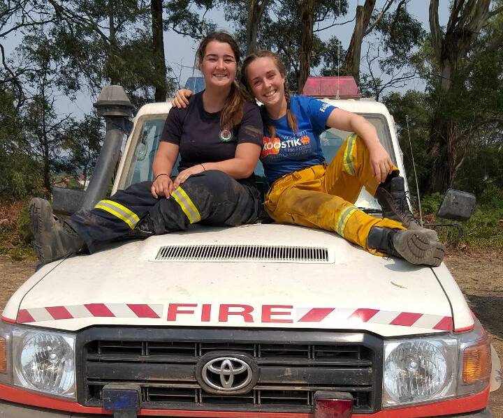 Teamwork: Wallaby Joe's youngest member Eddi Raglus (right) with Taree firefighter Steph Harrison volunteering for the Lithgow strike team. Photo: Submitted