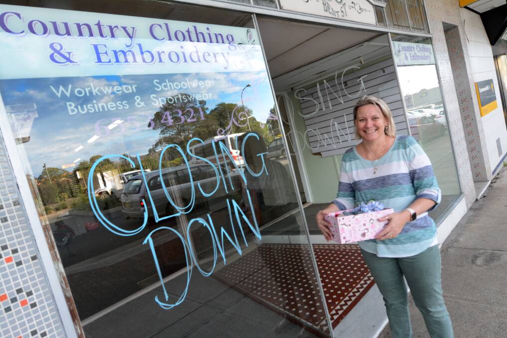 Last day: Sharelle Lewis on the last day at Country Clothing and Embroidery in Bent Street. The business has operated since 2009. Photo: Scott Calvin