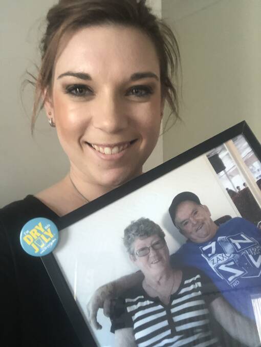 Lauren Molloy with a photo of her mother-in-law Yvonne Ratcliffe who died from cancer on Mother's Day. Lauren is fundraising for Dry July to help people affected by cancer.