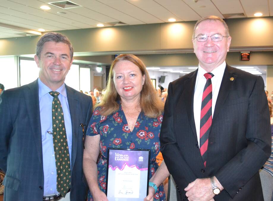 Member for Lyne David Gillespie with Member for Myall Lakes Stephen Bromhead presenting Donna Carrier with the award for 2017 Myall Lakes Local Woman of the Year.