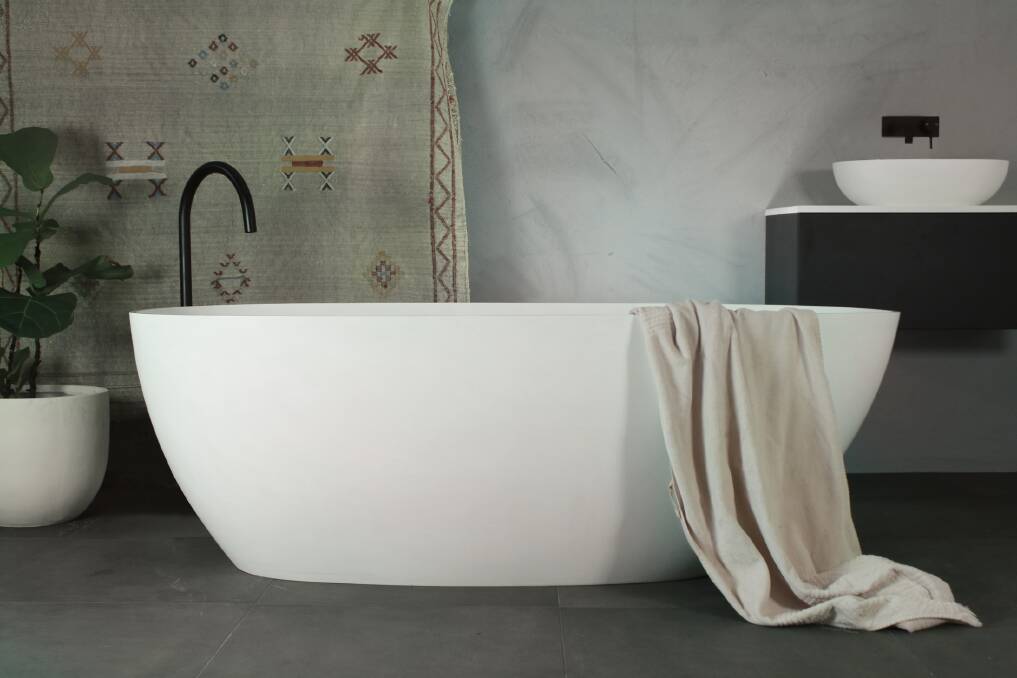 Soak: Highgrove Bathrooms' Lusini Stone Bath has a very thin edge (15mm) but offers up to 50 per cent longer heat retention than typical acrylic and steel baths.