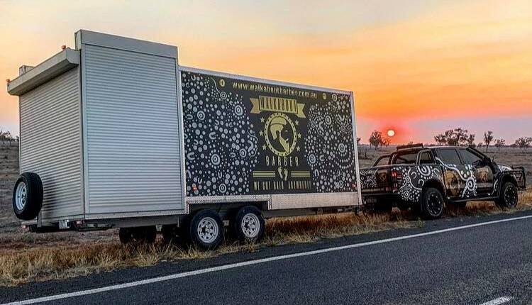 The Walkabout Barber rig on the road between Brewarrina and Walgett. It will arrive in Taree on November 14 and set up in Queen Elizabeth Park.