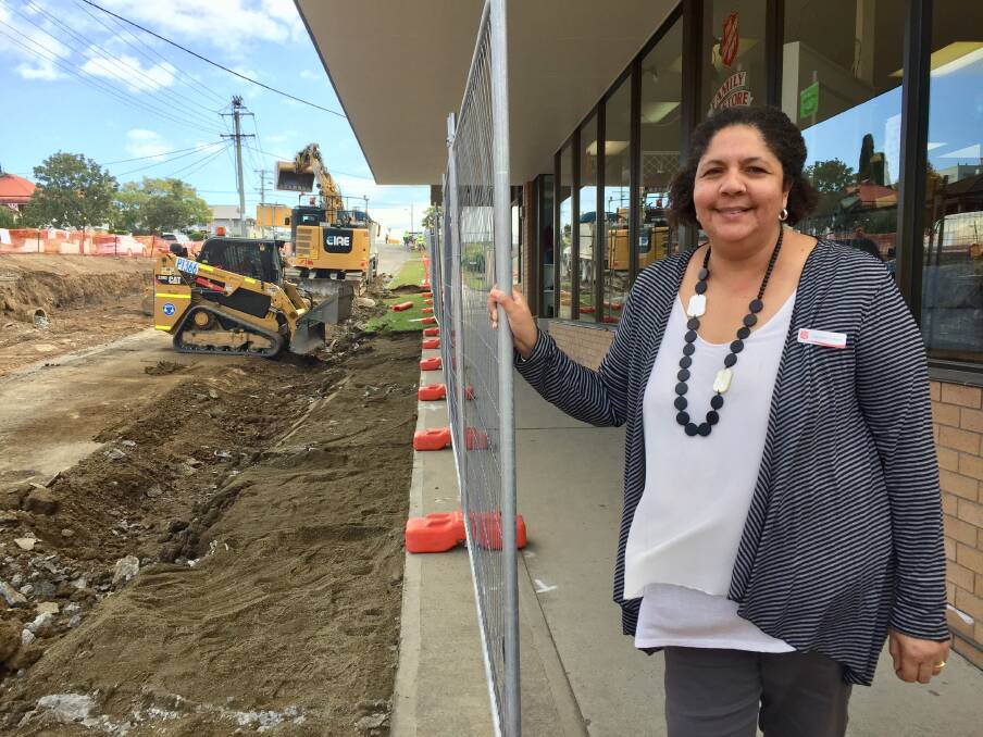 "We are open!" Taree Salvation Army Family Store manager Danielle Volkers urges the community to continue to support its Pulteney Street store. Click photo to read story. Photo: Ainslee Dennis.