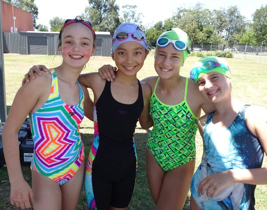Amelia Richards, Lara Coleman, Jessica Skender and Tiera Kingsmill at the Taree Christian College swimming carnival.