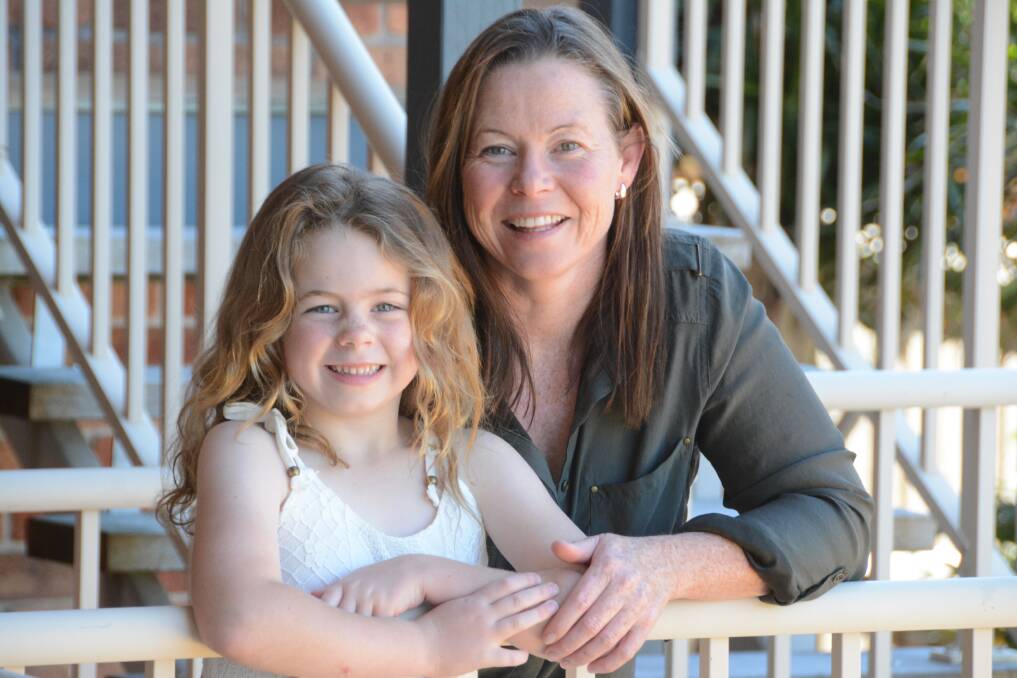 Rebecca Cross with her daughter Amaya. In October 2016 she secured an Australia's Backyard Legend award for the help she provides to others in our community. A few months later she began her fight with the Department of Human Services to prove she should not have a $1700 Centrelink debt. 