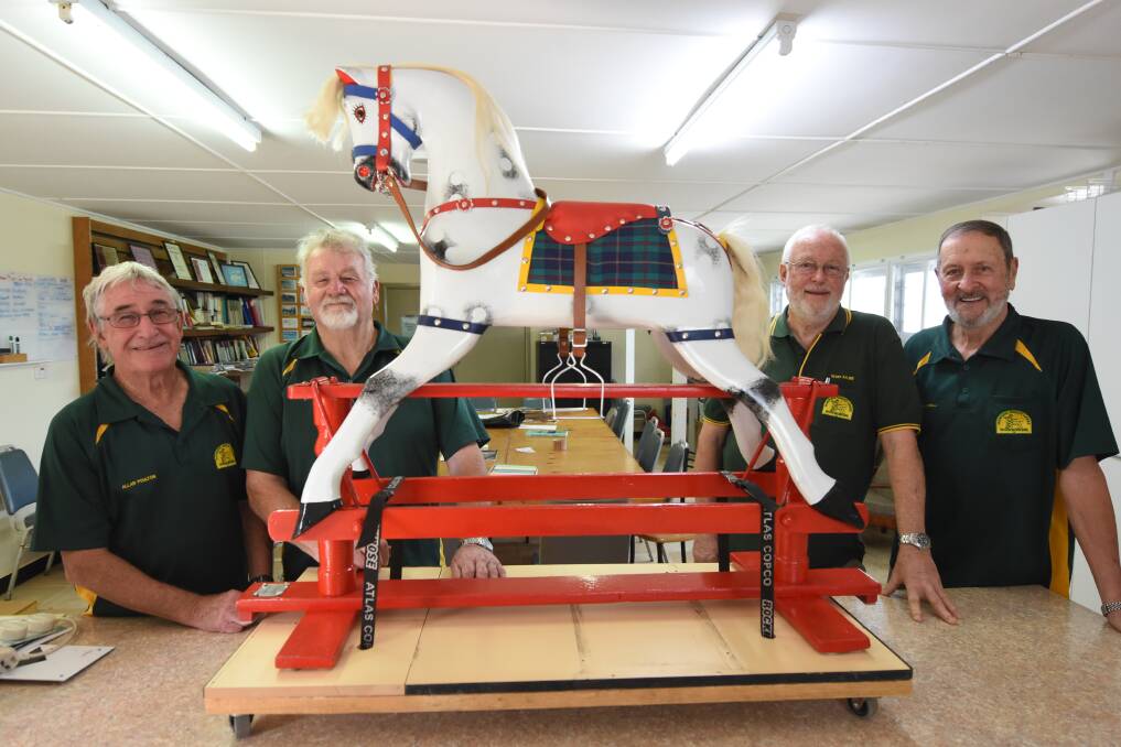 Allan Poulton, Kim Fetherston, Geoff Ayling and Peter Kinsella are part of the team of Manning-Great Lakes Woodworkers who contributed to the restoration of 'Horsey'. Photo: Scott Calvin.