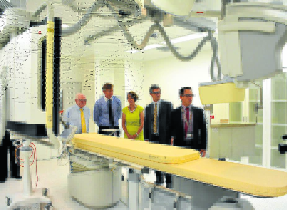 Federal Member for Lyne, Dr David Gillespie and State member for Port Macquarie Leslie Williams tour the cardiac catheterisation labratory prior to its opening at Port Macquarie Base Hospital in 2015.