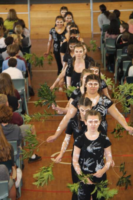 St Clare's High School indigenous female students perform in the school NAIDOC Week celebration.