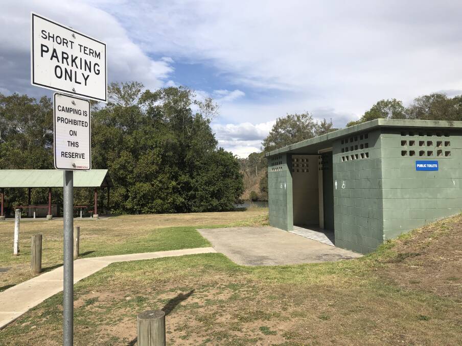 Public toilets are locked at night in the MidCoast Council area and signage indicates council's rules for public use of the Wingham Riverside Reserve. Photo: Ainslee Dennis.