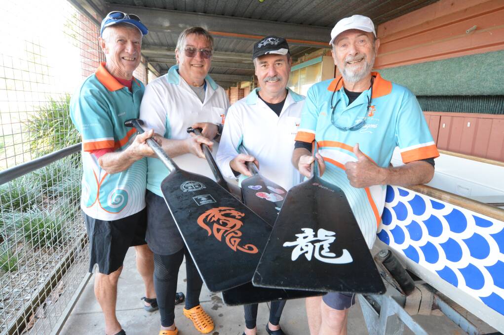 Pick up a paddle: Manning River Dragons Warren Blanch, Michael Champion, Wayne Sullivan and John Roetman will be on hand to teach at the club's 'Come and Try Dragon Boat Paddling Day' on Saturday.