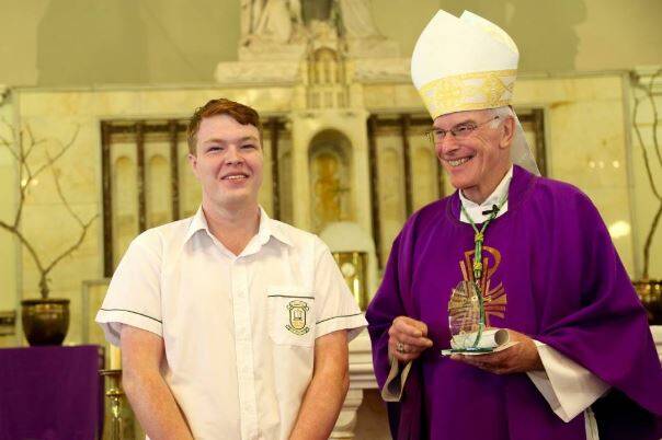 St Clare's High School student Anthony McMullen with Bishop Bill Wright.