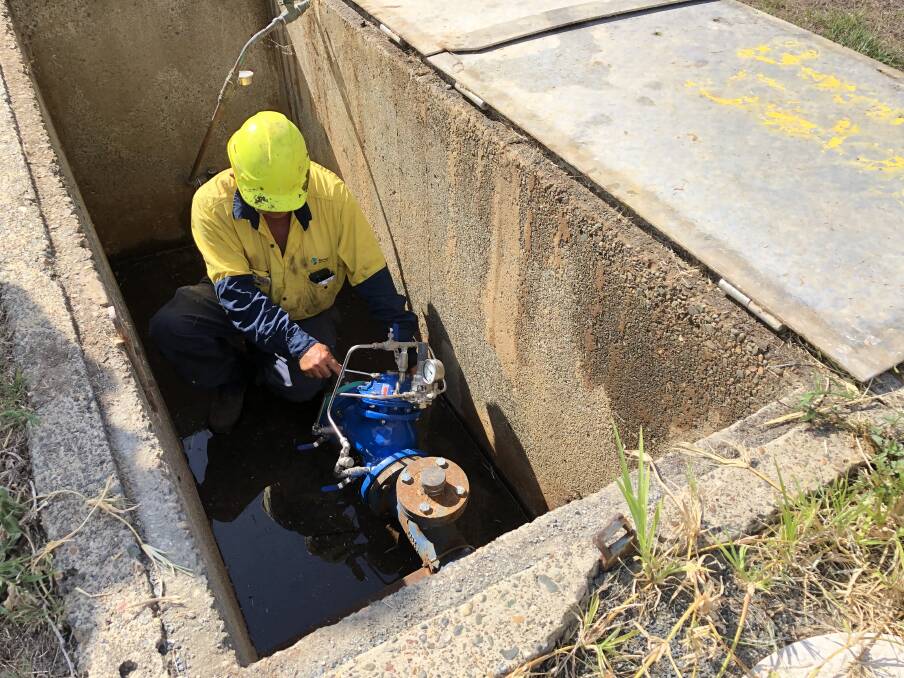 MidCoast Council staff frequently attend the pit on the corner of Burdett Street and Peveril Street in Tinonee to try to fix water supply problems. Staff recently installed a new pressure reducing valve to try to reduce the number of high water pressure incidents. Photo: Ainslee Dennis