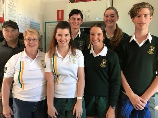 St Clare's High School teachers Phil Schipp and Denise Ryan with year 10 students Clare Chapman, Luke Earley, Dani Altham, Jessica Horsburgh and Oscar Norman at Taree Community Kitchen.