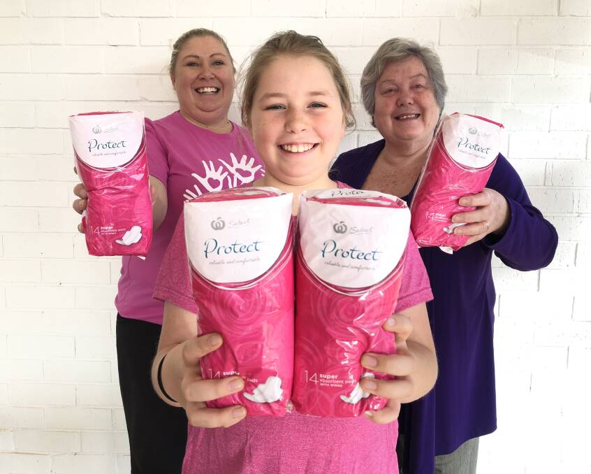 Goal: Sounding the call for donations to the 'Share the Dignity' August Dignity Drive is (from left) Nicole Wiffen, Ella Sowter and Susan Ballard. Photo: Ainslee Dennis.
