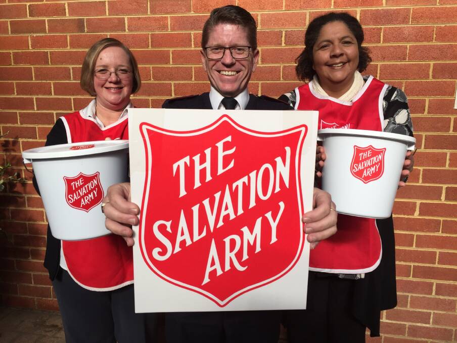 Earlier this week major Michael Hogg, major Sandy Hogg and Taree Family Store manager, Danielle Volkers were working to promote and appeal for volunteers to help raise money during this weekend's Red Shield Appeal. Photo: Ainslee Dennis.