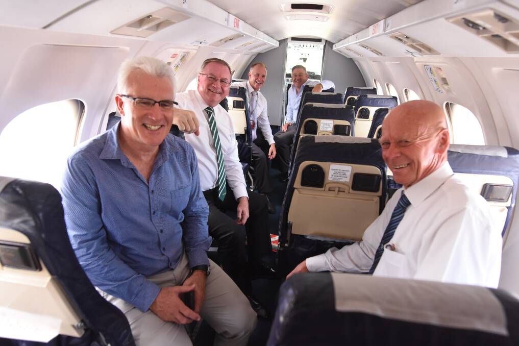 FlyPelican celebration: Former MidCoast Council general manager Glenn Handford, mayor David West, member for Myall Lakes Stephen Bromhead, FlyPelican CEO Paul Graham and council's director, community spaces and services, Paul De Szell at the December 19 announcement that FlyPelican will deliver direct Sydney flights.