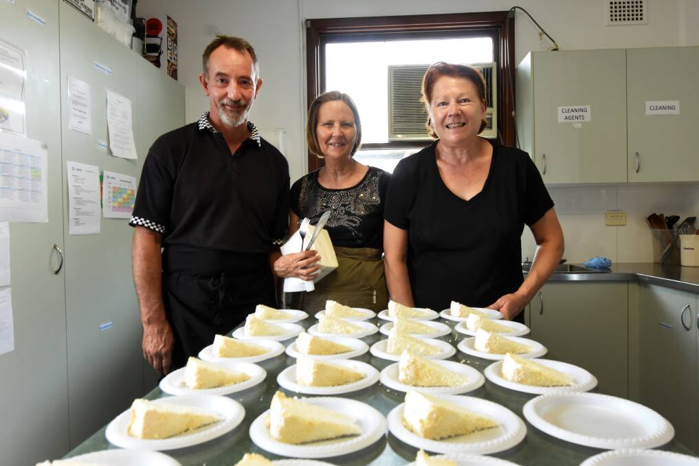 Preparing to serve something sweet in Taree Community Kitchen is Richard Clement, Louise Spence and Vicki King.
