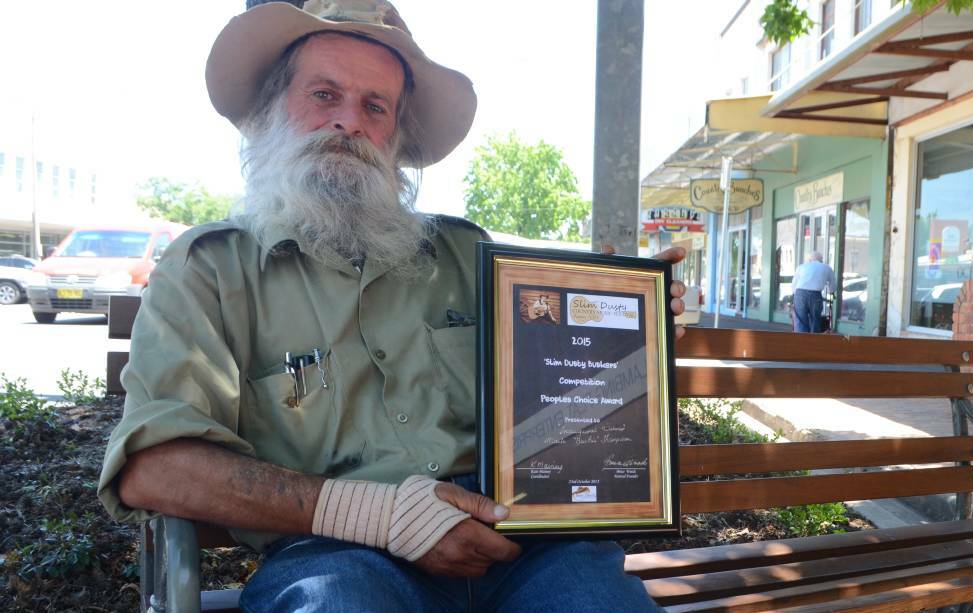 DIE-HARD SLIM DUSTY FAN: Mark 'Bushie' Thompson has been recognised for his poetry at many events across the country.